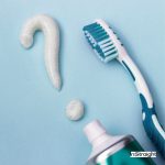 colgate and toothbrush